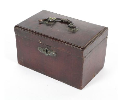A George III mahogany rectangular tea caddy, the hinged cover fitted with three brass canisters and covers, with key, 21 cm w