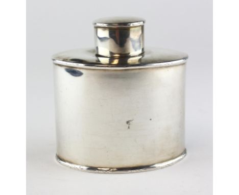 An Edwardian silver tea caddy of oval form, the borders with reeded decoration, hallmarked Birmingham 1909 by Elkington &amp;