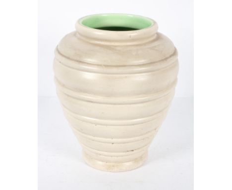 A Clarice Cliff vase, model 71A, of banded, tapering form, cream galzed exterior and lime green interior, printed marks, 30cm