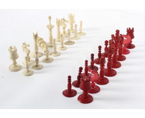 A Victorian ivory and bone chess set, the King 9.5cm tall, high damages.