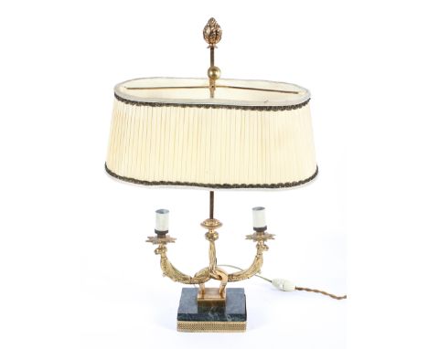 A French style gilt-metal and marble-mounted table lamp, 20th century, with two mythical beasts branches issuing lights, cent