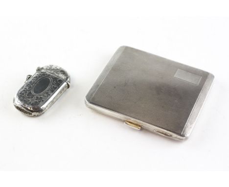 A silver cigarette case with engine turned decoration, hallmarked for Brimingham 1933, by William Neale &amp; Son Ltd and a v