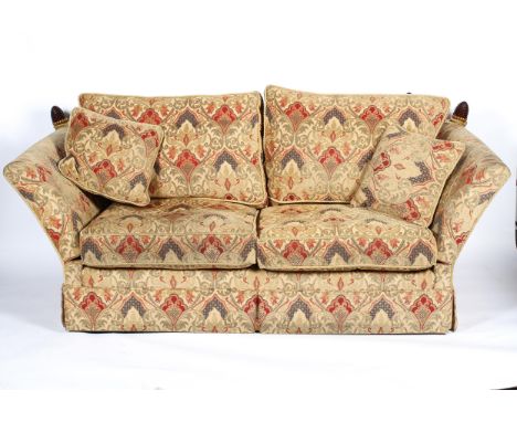 A contemporary two-seater drop-side sofa, with final cone finials and rope ties to top corners and drop sides, with drop-in a