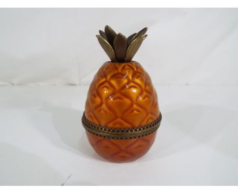 A vintage Evans enamelled table lighter in the form of a pineapple Est £20 - £30