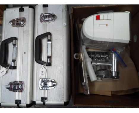 An Andrew James meat grinder, a pack of barbecue skewers and two aluminium protective carry cases