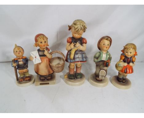 Goebel Hummel - Five Goebel Hummel figurines, one entitled A Stitch in Time, another Meditation, one depicting a boy walking 