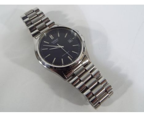 Casio - a gentlemen's wrist watch marked Casio