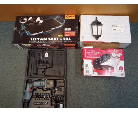 A good mixed lot to include a cased Hilka cordless drill, a Delta kitchen Teppan Yaki grill in original box, a cake pop maker