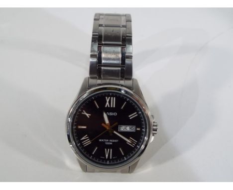 Casio - a gentlemen's wrist watch marked Casio