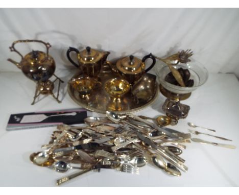 A good lot to include a quantity of plated ware to include four piece tea service, serving tray, spirit kettle on stand and f