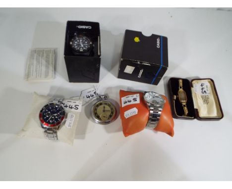 A collection of wristwatches to include an Orlando, Casio, Royal Observatory Greenwich, a yellow metal wristwatch with Swiss 
