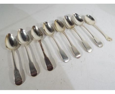 George III - seven hallmarked silver dessert spoons, London Assay, various dates and a further later hallmarked silver spoon,