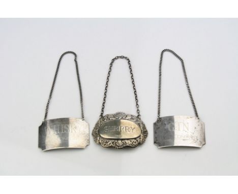 Silver sherry decanter label, repoussé shell and foliate scroll surround, makers S J Rose &amp; Son, Birmingham 1978; togethe
