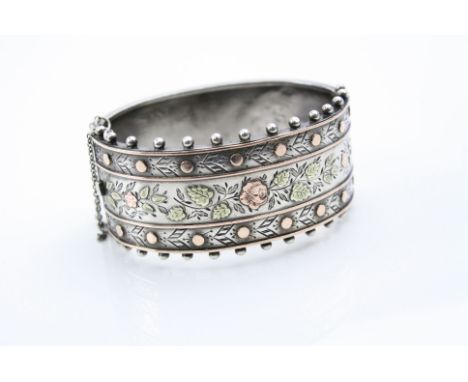 Victorian style parcel gilt silver hinged bangle, cast rose and foliate decoration, bead detailing, tongue and box clasp comp