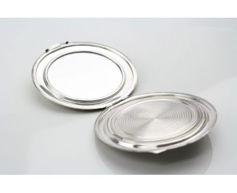 Silver circular compact, engine turned decoration to lid and verso, rectangular blank cartouche, makers W I Broadway &amp; Co