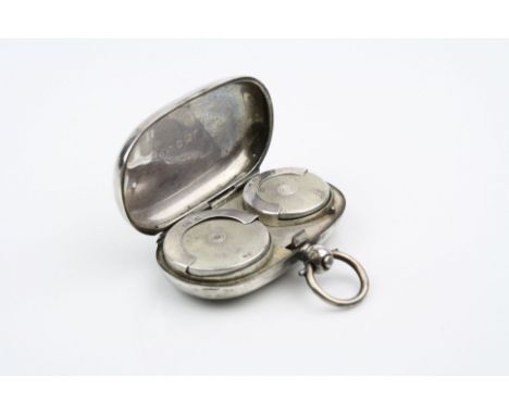Silver oblong double sovereign case to contain sovereigns and half sovereigns, engine turned decoration and blank circular ca