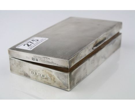 Silver rectangular cigarette box, engine turned decoration to hinged lid, plain polished body, makers William Neale &amp; Son