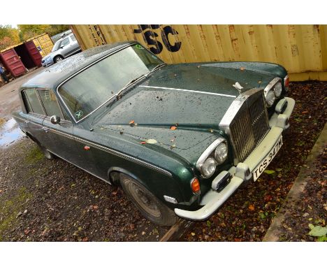 A 1974 ROLLS ROYCE SILVER SHADOW FOUR DOOR SALOON MOTOR CAR, finished in British Racing green with cream leather interior, 67