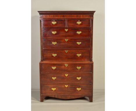 A 19TH CENTURY MAHOGANY CHEST ON CHEST, moulded pediment above two short and six long drawers, replacement escutcheons, brass