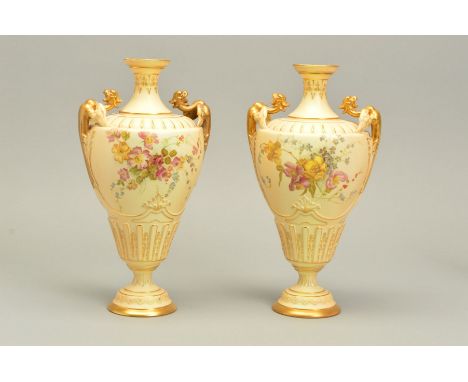 A PAIR OF ROYAL WORCESTER BLUSH IVORY TWIN HANDLED VASES, shape No.1674, printed and painted with pink and yellow roses, forg