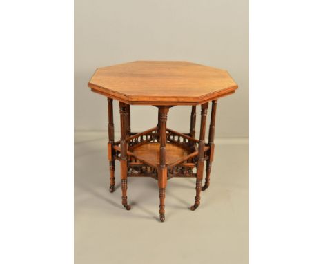 A LATE VICTORIAN ROSEWOOD OCTAGONAL OCCASIONAL TABLE, the base formed of eight reeded and spiral carved legs united by an und