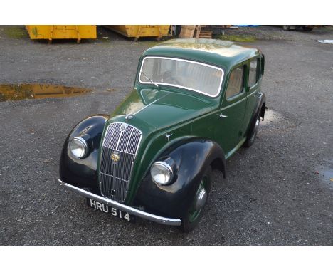 A RESTORED 1948 MORRIS 8 'E' SERIES FOUR DOOR SALOON MOTOR CAR, in green and black finish, 918cc petrol engine with a manual 