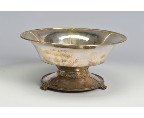 A GEORGE V SILVER CIRCULAR PEDESTAL BOWL WITH HAND HAMMERED FINISH, the stepped interior with raised nail shaped decoration, 