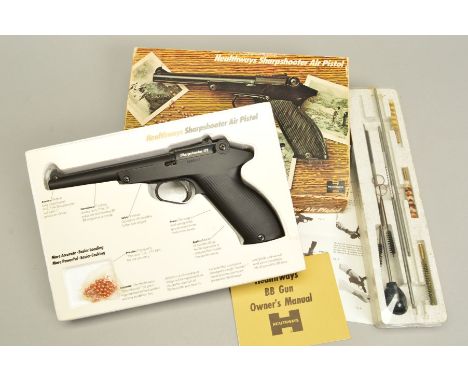 A BB HEATHWAYS SHARPSHOOTER 175 AIR PISTOL, serial number 0235523 in its original packaging complete with instructions and a 