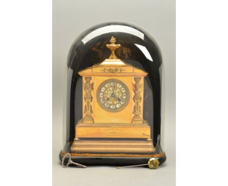 A LATE 19TH CENTURY GILT METAL MANTEL CLOCK OF ARCHITECTURAL FORM, urn shaped finial above a circular porcelain dial with gil