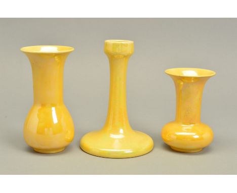 THREE PIECES OF RUSKIN POTTERY, comprising a candlestick, impressed Ruskin 1918 to the base, together with two vases, both da