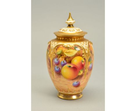 A ROYAL WORCESTER FRUIT STUDY POT POURRI, shape No.H169A, painted with apples and black cherries between gilt arches, signed 