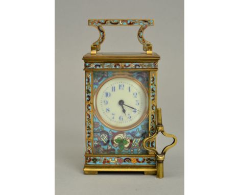 AN EARLY 20TH CENTURY FRENCH BRASS AND CHAMPLEVE ENAMEL CARRIAGE CLOCK, cream enamel dial, s.d., with blue Arabic numerals wi