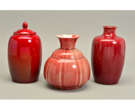 THREE PIECES OF PILKINGTON LANCASTRIAN POTTERY, comprising a lidded storage jar decorated in a flambe glaze, dated 1912, heig