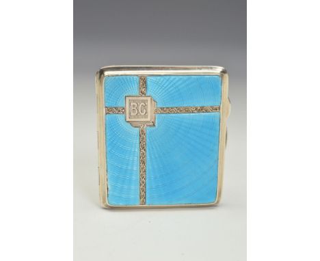 A GEORGE V SILVER AND BLUE ENAMEL CIGARETTE CASE, of rectangular form, engine turned and engraved decoration with initials in