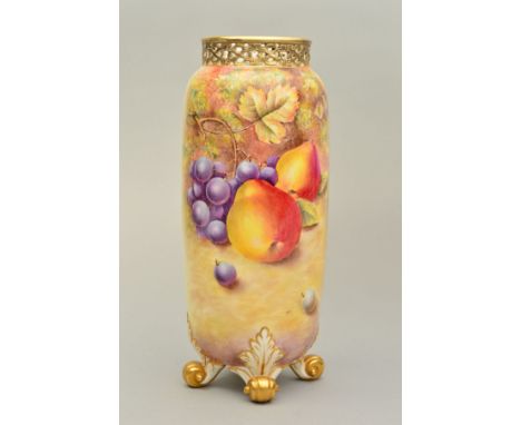 A ROYAL WORCESTER FRUIT STUDY VASE, with reticulated rim, on four scrolled leaf feet, shape No.G.42 L/S, painted with pears a