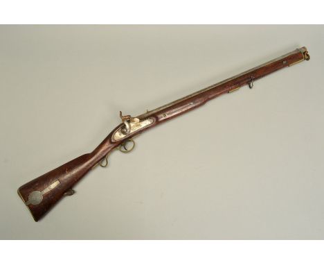 A 10 BORE PERCUSSION MUSKET, bearing the Rampant Lion motif on the lock indicating former ownership by the East India Company