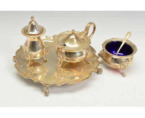 AN ELIZABETH II SILVER WAITER, pie crust rim, on four short cabriole legs to scrolled feet, specimen hallmarks, maker William