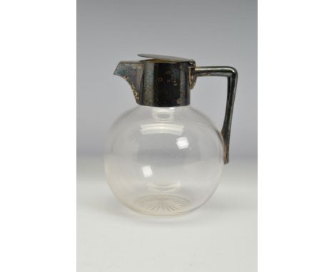 A LATE VICTORIAN HUKIN &amp; HEATH SILVER MOUNTED GLASS CLARET JUG TO A DESIGN ATTRIBUTED TO CHRISTOPHER DRESSER, hinged cove