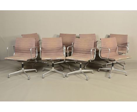 CHARLES AND RAY EAMES, a set of eight Vitra model EA107 aluminium desk armchairs with taupe upholstery (condition: worn seats