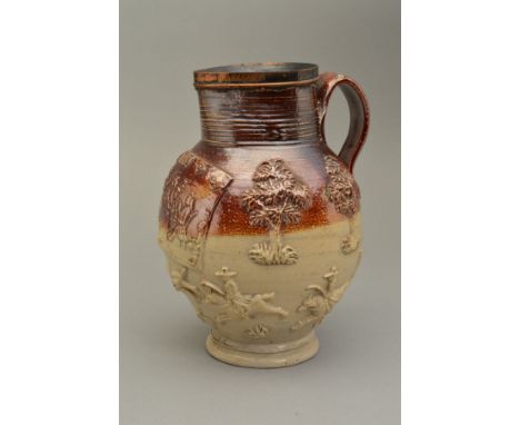 AN EARLY 19TH CENTURY SALTGLAZED STONEWARE JUG WITH PLATED RIM, engraved 'Sacred to Friendship to Mirth &amp; Mild Ale', hori