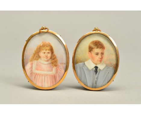 A PAIR OF LATE 19TH/EARLY 20TH CENTURY ENGLISH SCHOOL PORTRAIT MINIATURES, of a boy and girl, on ivory, oval, both initialled