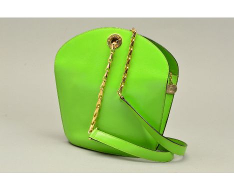 A VINTAGE CELINE SHOULDER BAG, in lime green, the bucket style bag with inner pocket and zip compartments, red leather lining