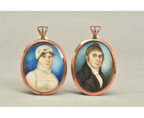 A NEAR PAIR OF EARLY 19TH CENTURY ENGLISH SCHOOL PORTRAIT MINIATURES, on ivory, of a lady in white dress and bonnet and gentl