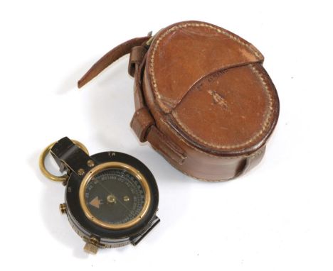 A First World War British Indian Army Prismatic Mk.VII Pocket Compass, with black embossed floating jewelled pivot dial, in a