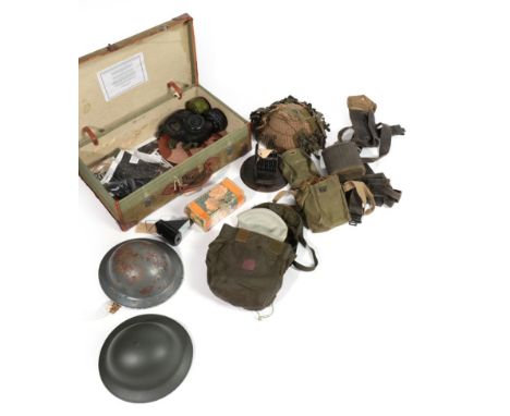 A Quantity of Second World War and Post War Militaria, including a 1939 date Brodie helmet, a modern Brodie helmet, a 1970's 