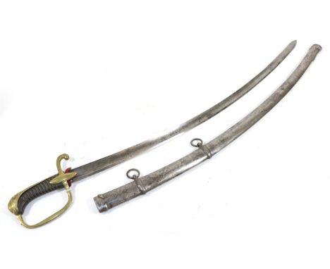 A French Light Cavalry Sword, with 83.5cm single edge curved and fullered steel blade, the later brass hilt with navette shap