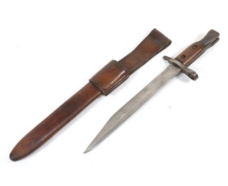 A First World War Ross Mk.2 Bayonet, with 25.5cm pointed steel blade, the steel hilt with rivetted wood grip scales, the pomm