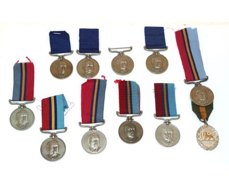 A Collection of Eleven Rhodesian Medals:- Rhodesian GSM &amp; Territorial to PR30062 Rfn R R Howlett; three District Service 