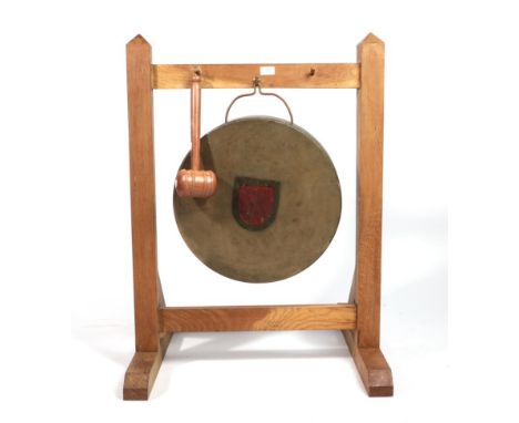 A Royal Navy Post Second World War Cast Bronze Deck Gong, painted with a red and black shield faintly inscribed DEFENDER, on 