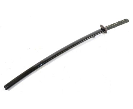 A Japanese Shinto Katate Uchi (Wakizashi), the 58cm unsigned blade with faint narrow hamon and narrow fuller to the back edge